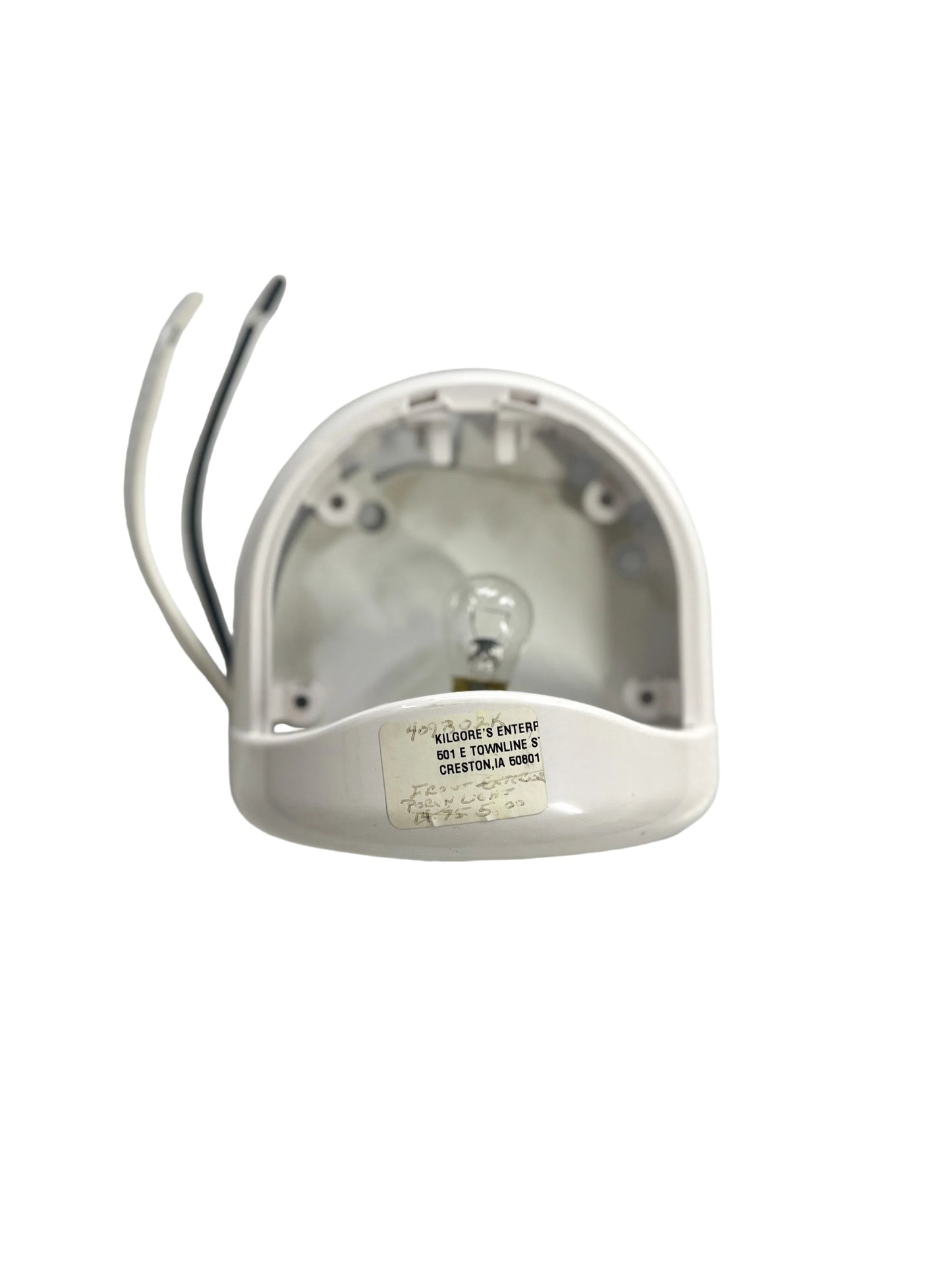A white porch light fixture without a lens, mounted on a wall.