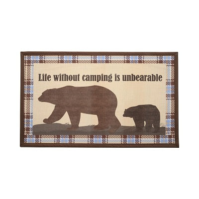 A rectangular accent rug with a plaid pattern and the text 'Life Without Camping Is Unbearable' printed on it, featuring images of bears in a forest setting.