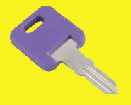 Key blank with purple at one end and silver metal at the other