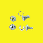 Two metal bolts with nuts and washers, isolated on a yellow background.