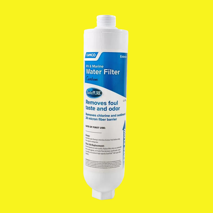 A white Camco water filter canister with blue and black text, indicating that it removes foul taste and odor, and that it is suitable for use with 2-1/4 inches microbial filter material.