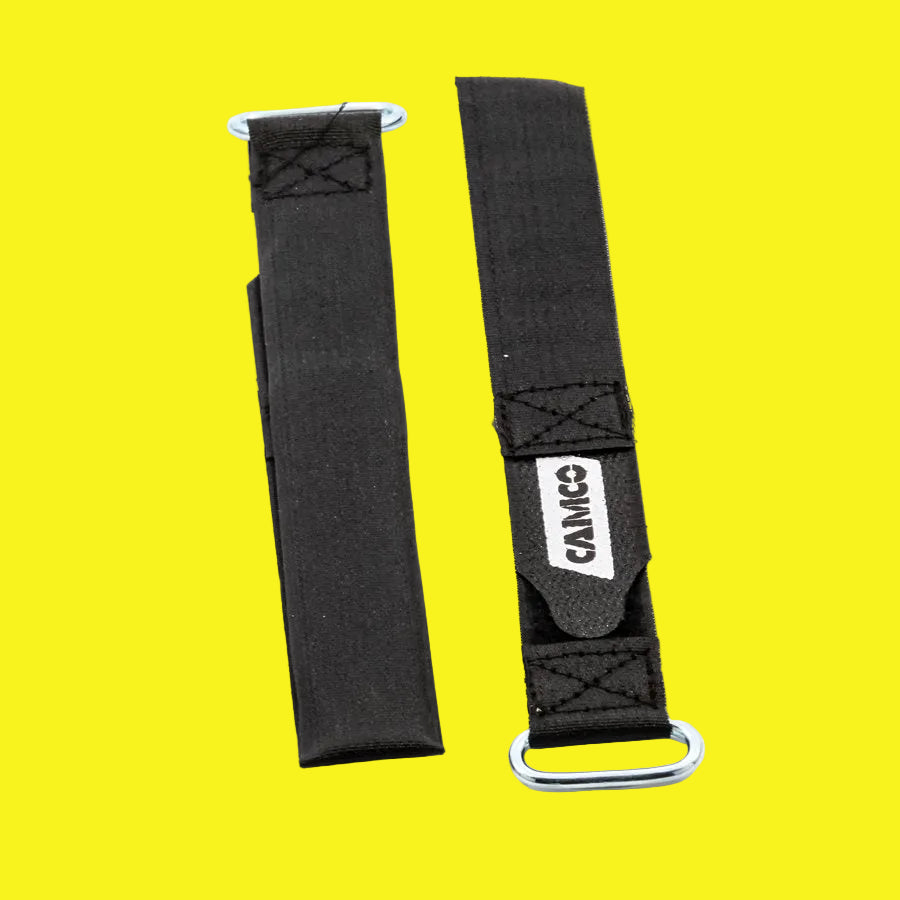 Two black Velcro straps with metal buckles, one strap has the brand name 'CAMCO' written on it.