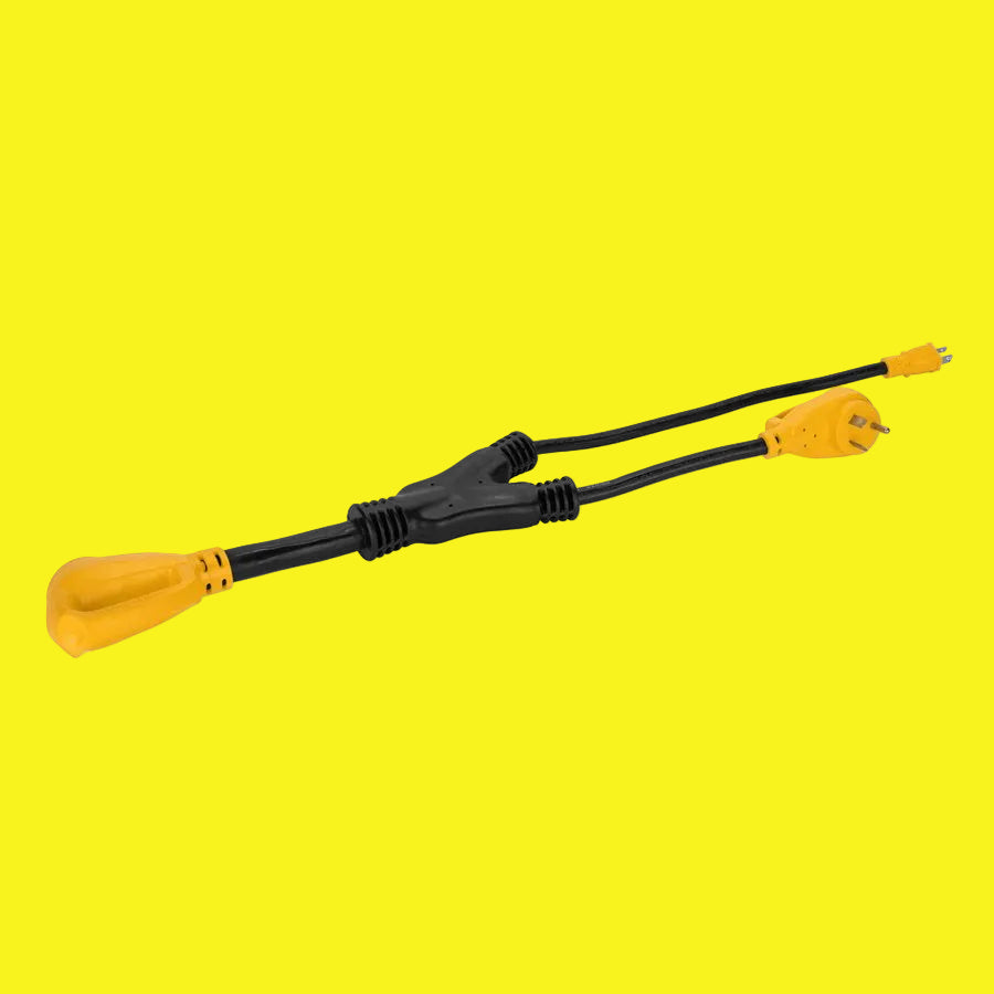 A power cord adapter with three yellow plug ends and a black power cord in between.