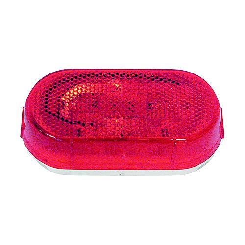 A red plastic lens for vehicle clearance or side marker light.
