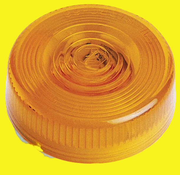 A round, amber-colored clearance light for vehicles with a lens diameter of 2-7/8 inches, surface mount, and without trim.