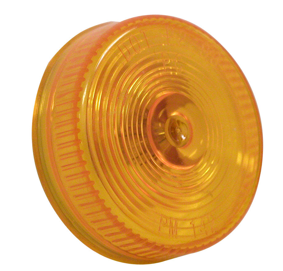An amber-colored clearance light for vehicles, with a round shape and a lens in the center.