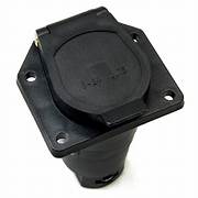 A black 7-way flat pin connector vehicle end designed for RV trailers with visible brand marking.
