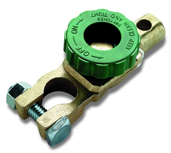 A green knob-operated battery disconnect with metal components and a rubber gasket.