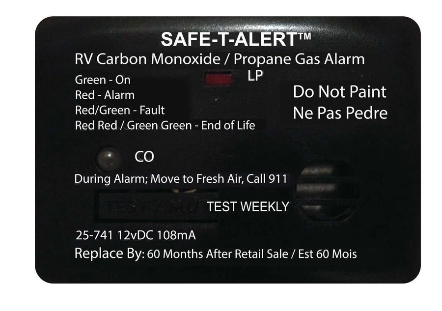 A black MTI Industries Mini Dual Carbon Monoxide/Propane Alarm with safety instructions and a test button. The label indicates it is an RV carbon monoxide/propane gas alarm, and provides instructions for use during movement to fresh air.