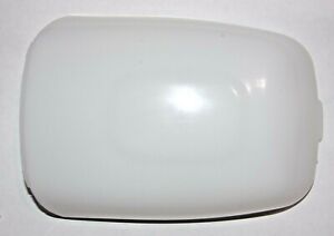 A white, clear frosted lens for vehicle interior lighting.