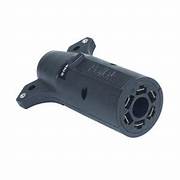 A black Pollak trailer wiring connector adapter with a 7-way blade to 6-way pin design.