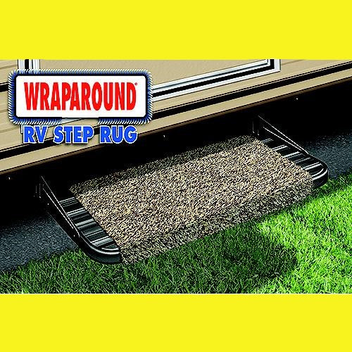 A textured brown wraparound RV step rug shown installed on an RV step, with grass visible below and a 'WRAPAROUND RV STEP RUG' logo overlay.