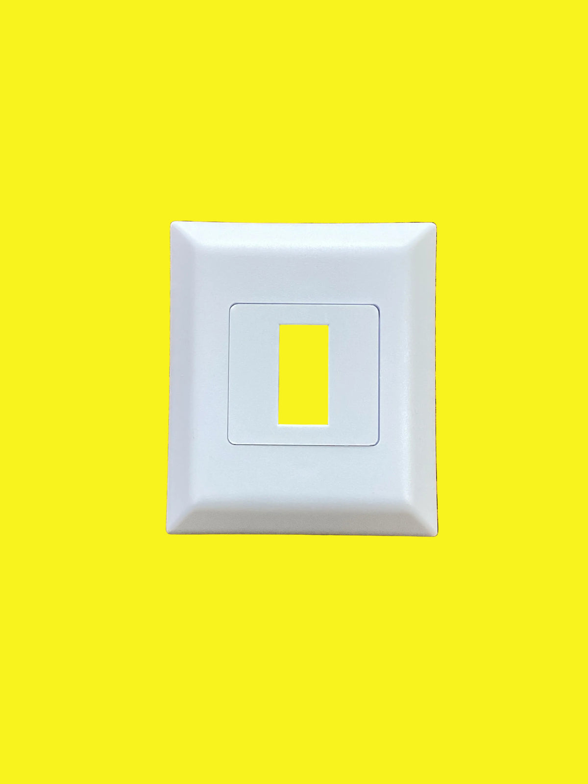 A white single switch base and face plate