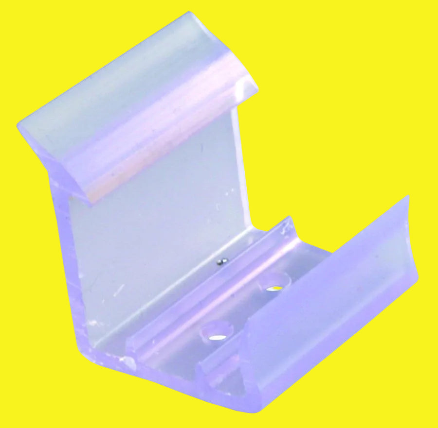 A clear plastic sliding mirror door catch with mounting screws.