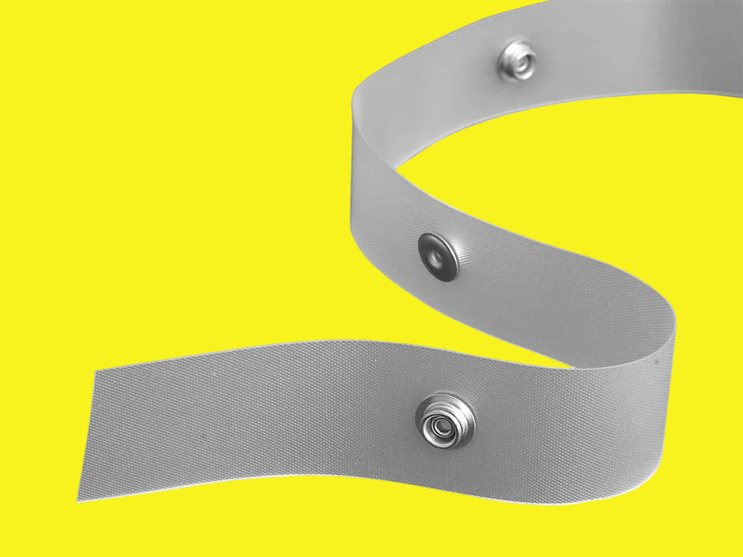 A length of clear snap tape with snap spacing designed for use with RV Designer window curtain gliders.