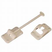 A colonial white plastic T-style door holder for RVs, consisting of a straight rod with a hook on one end and a mounting plate on the other.