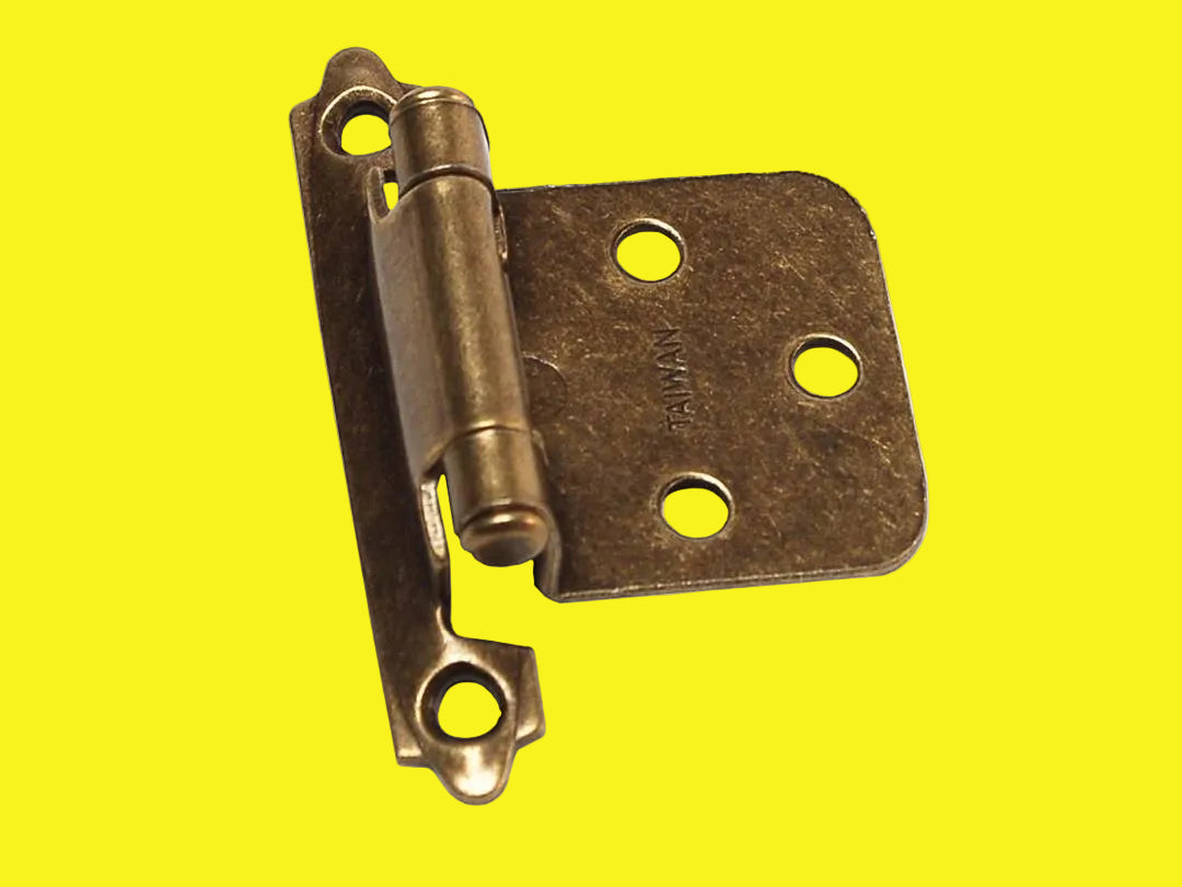 Antique finish metal self-closing hinge for RV doors.