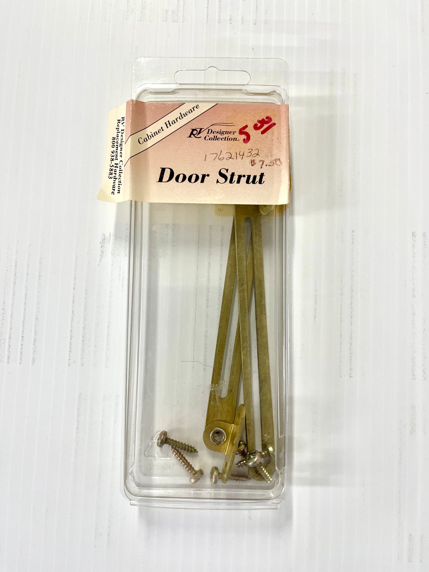 A pack of two metal door struts in a clear plastic packaging with a label showing the product details.