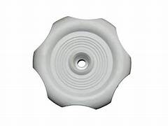 A white plastic window crank knob with a circular fluted design and a central bolt for installation.