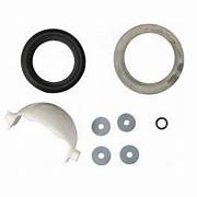 A set of toilet waste ball kit components including a waste ball assembly, a closet flange seal, a waste ball seal, and a waste ball drive arm.