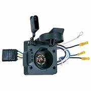 A black Hopkins trailer wiring connector adapter with a 4 flat to 7 blade and 4 flat connector, including a bracket and hardware.