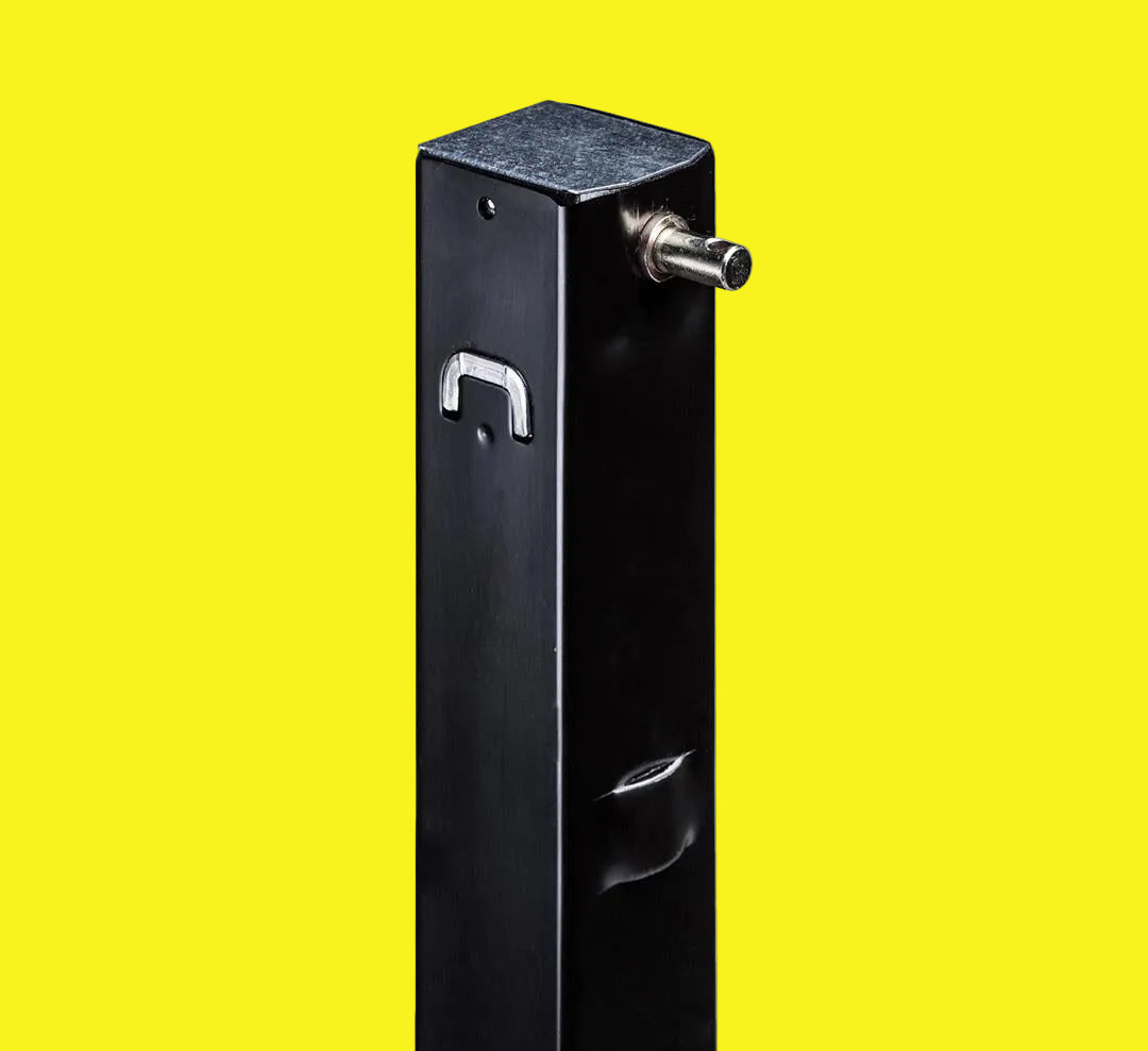 A black metal follow leg for 5th wheel camper landing gear with a drop leg and cage pin.