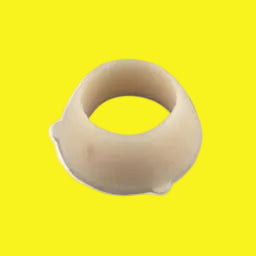 Beige rubber grommet on a yellow background
