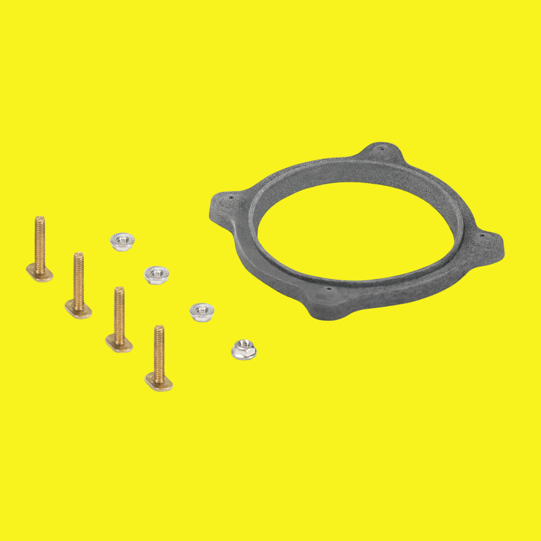 A single gray floor flange seal with mounting hardware, displayed against a yellow background.