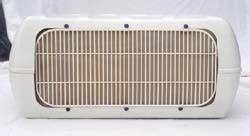 A white powder coated steel air conditioner shield with a grid-like pattern, designed to protect the coils and fins of an air conditioner.