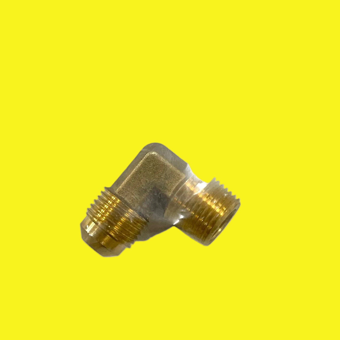 A 1/2 inch brass elbow fitting