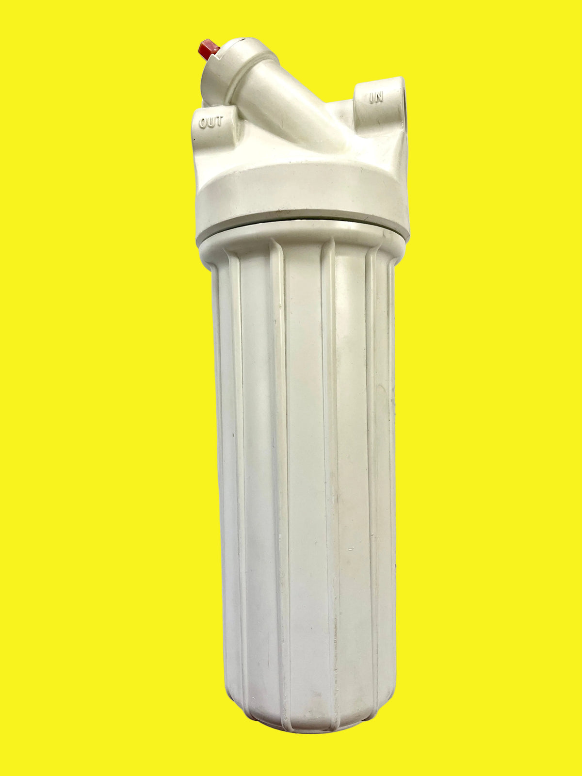 A white water filter canister with a twist off lid and two female threaded inlets for water lines.