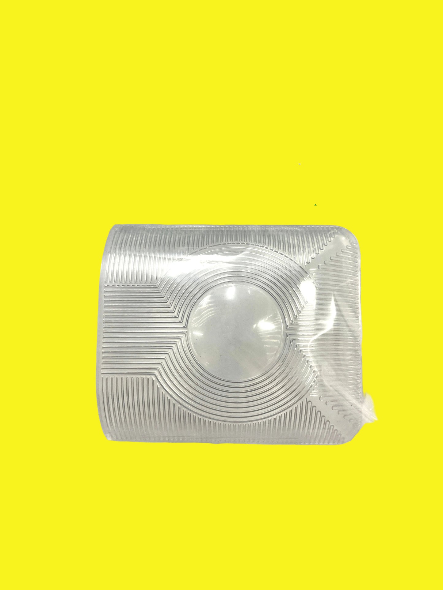 A clear plastic lens for vehicle interior lighting.