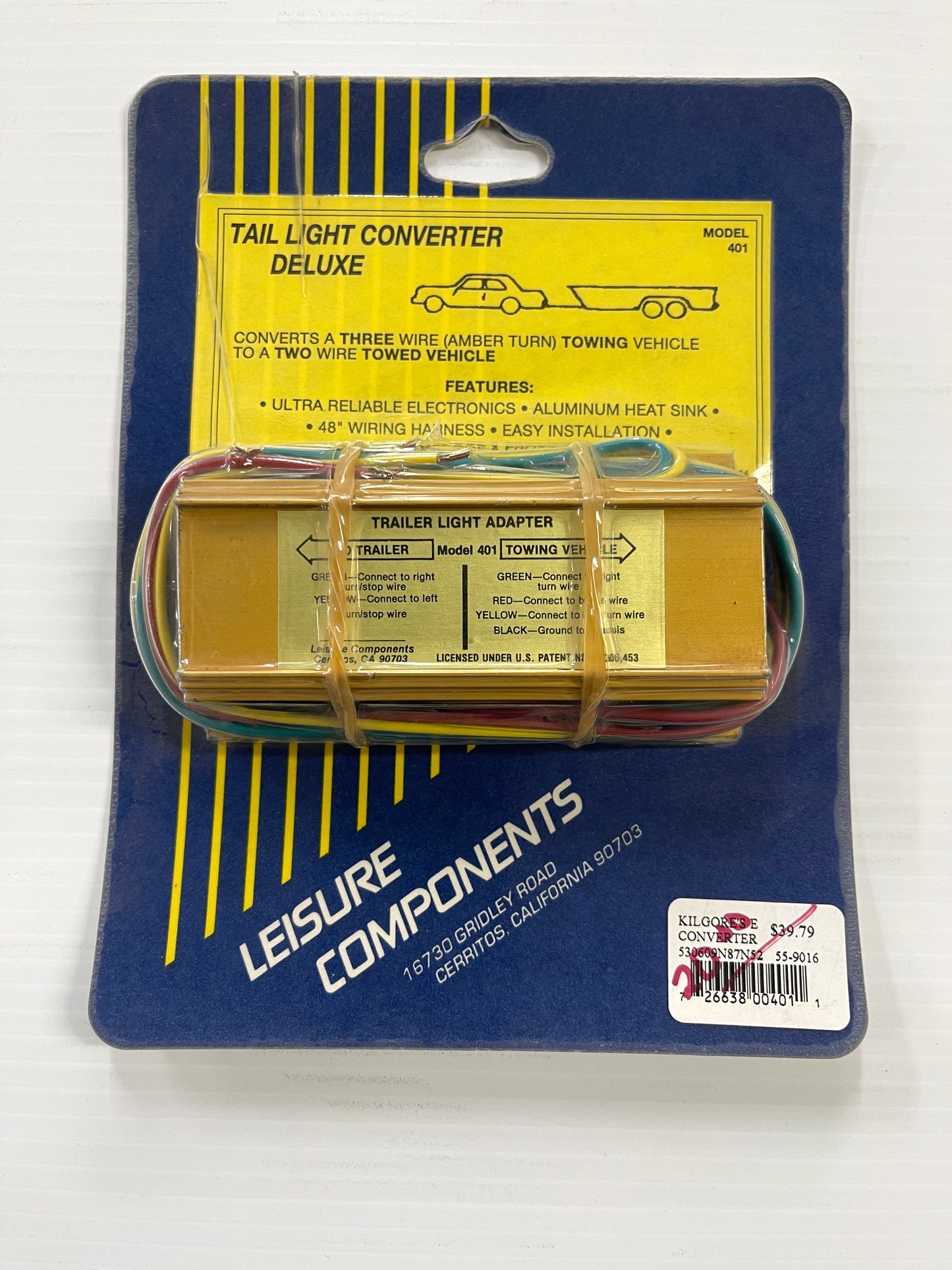 A tail light converter for a three wire towing vehicle to a two wire towed vehicle. Shown in a blue and yellow package.