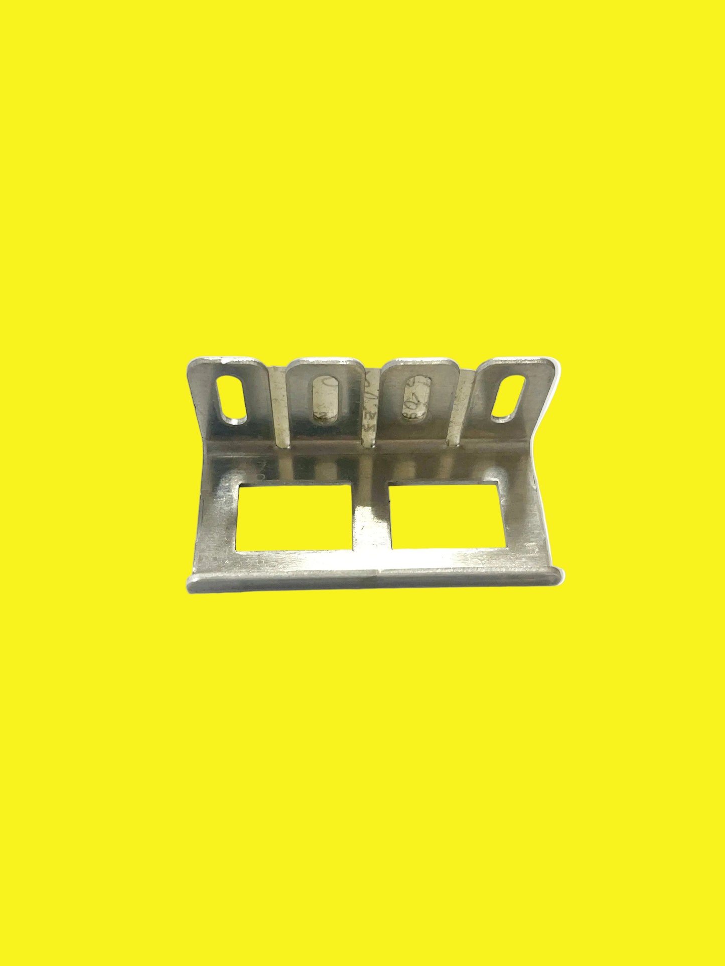 A metal switch plate cover mounting bracket