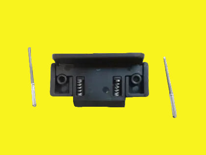 A black horizontal window latch with mounting hardware on a carpeted surface.