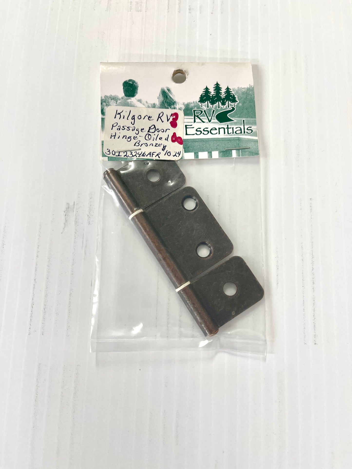 A packaged non-mortise hinge in oil rubbed bronze, displayed on a white background.