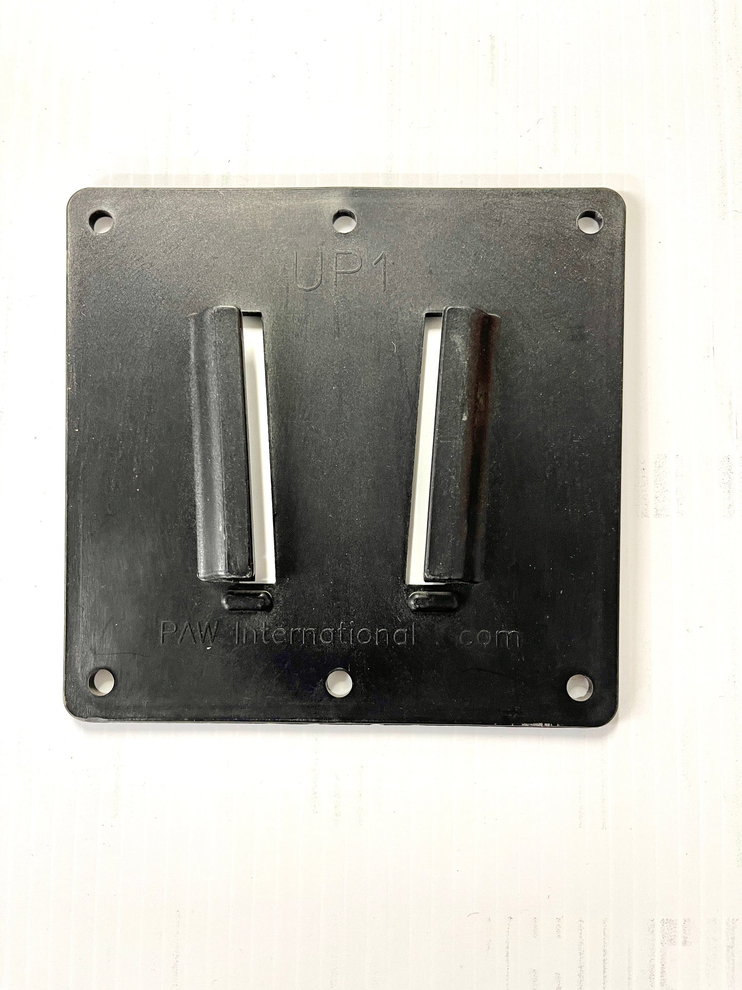 A black plastic TV mount bracket with a 'V' slide mechanism.