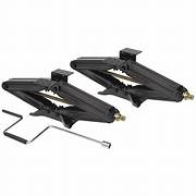 Two black scissor jacks with crank handles and mounting plates, designed for RV stabilization.