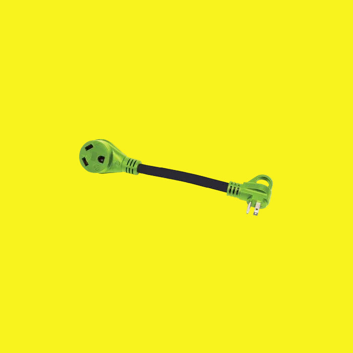 A green and black dog bone-shaped power adapter with a finger grip handle and a male-female connector.