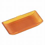 A single amber-colored porch light lens.