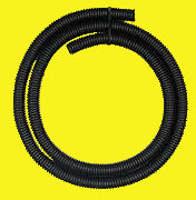 A coil of black refrigerator drain hose.