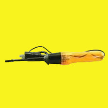 A yellow and black test lite with attached wiring.