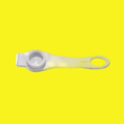 White plastic water inlet strap on a yellow background