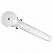 Hand held white plastic showerhead with a single function spray setting.
