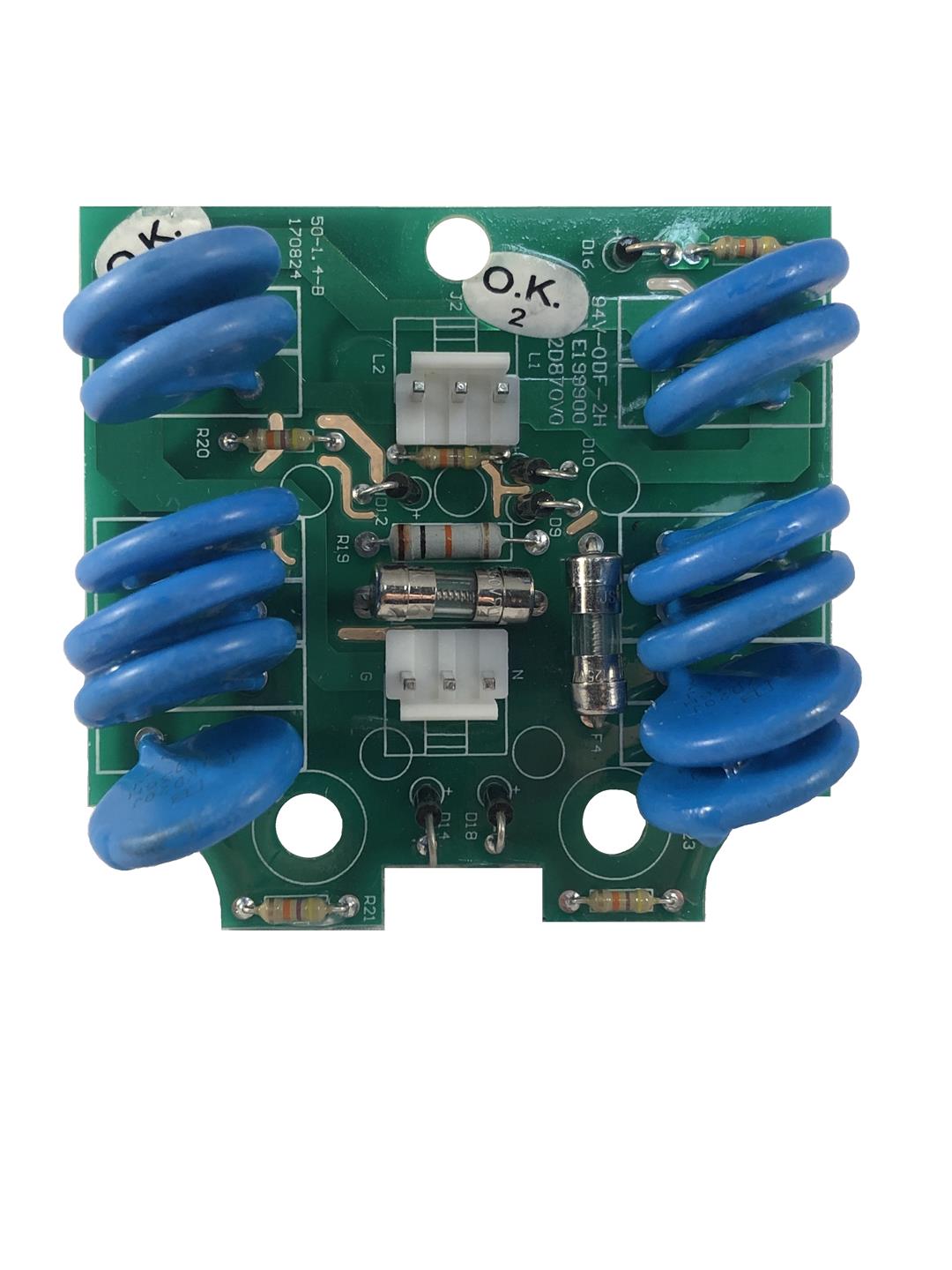 A green printed circuit board (PCB) surge protection module with blue capacitors, and various other electronic components.