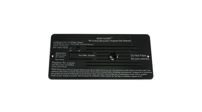 A black flush mount dual carbon monoxide and propane gas alarm with a beeping sound, designed for 12 Volt hardwire.