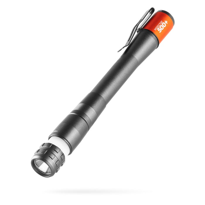 A black and orange NEBO Inspector 500+ penlight with a magnetic base and steel clip.