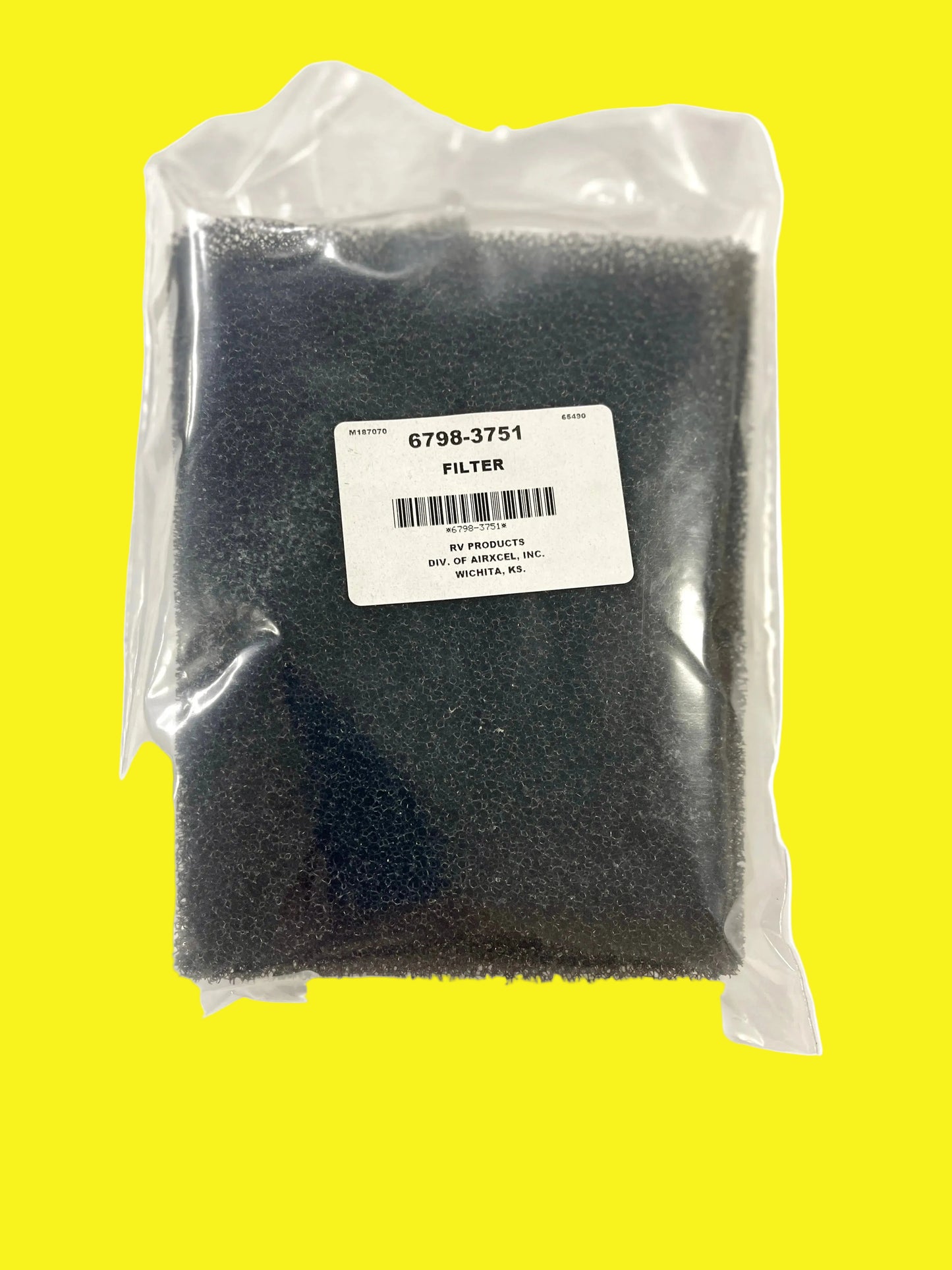 Air conditioner filter in packaging, predominantly black in color with a label showing part number 6798-3751.