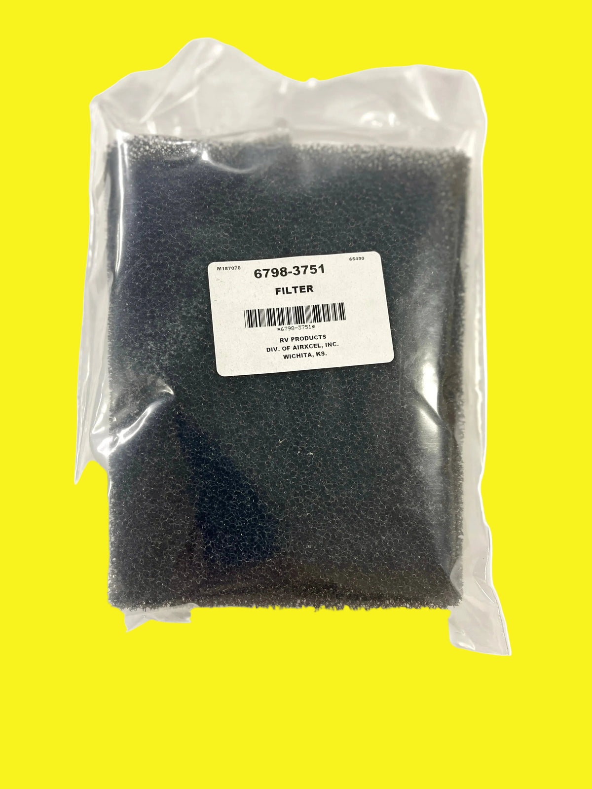Air conditioner filter in packaging, predominantly black in color with a label showing part number 6798-3751.