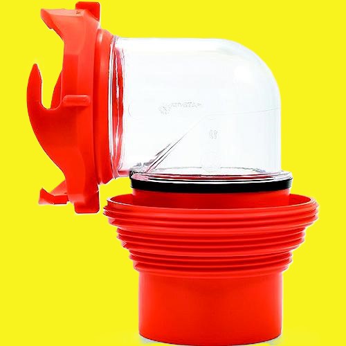 A sewer hose adapter with a clear 90 degree elbow, a red bayonet fitting at one end and a red threaded fitting at the other